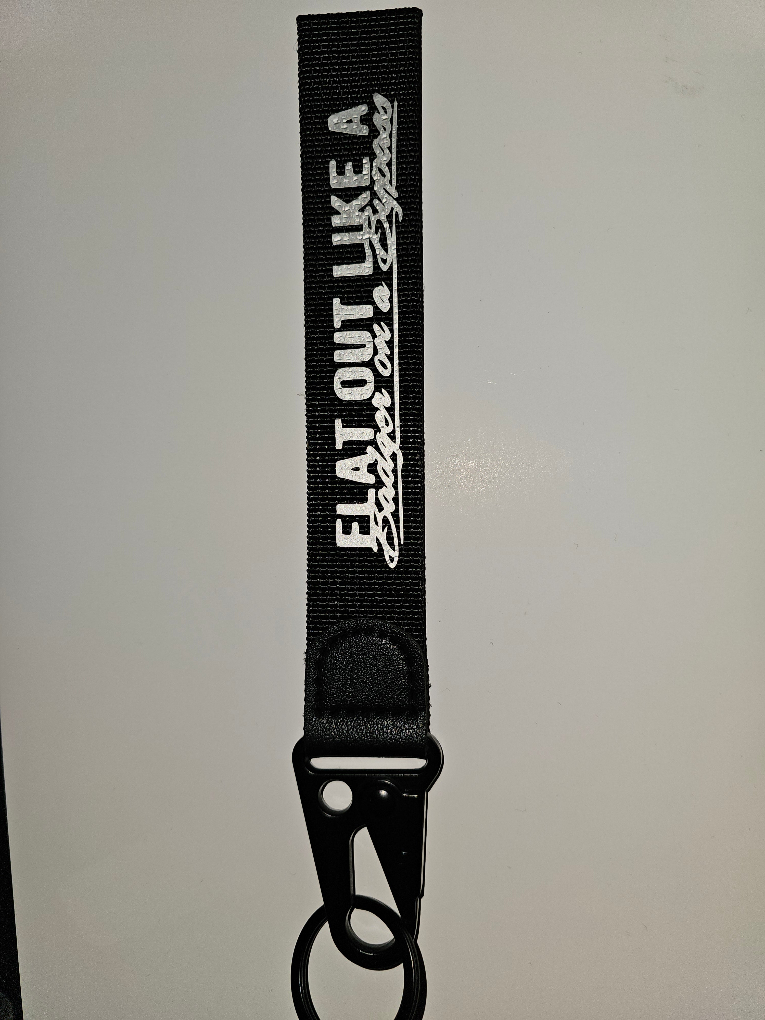 Flat out like a badger wrist strap key ring